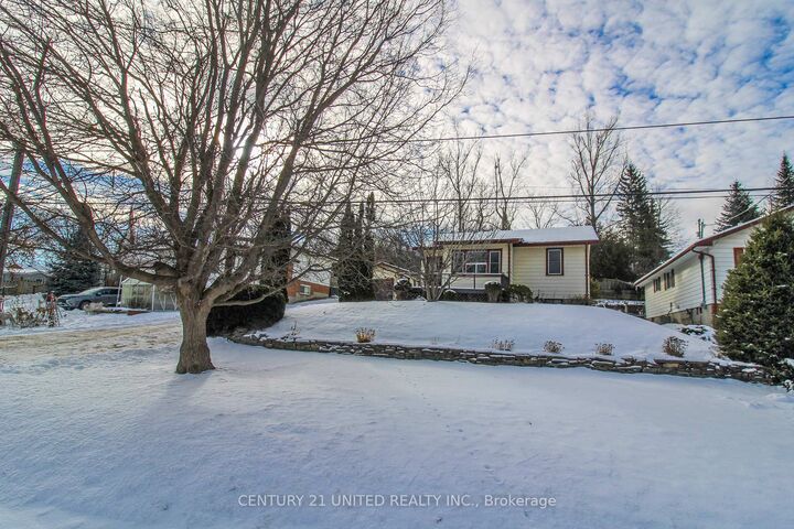 Property Photo: 611 Ashburnham Drive ON K9L 2A2