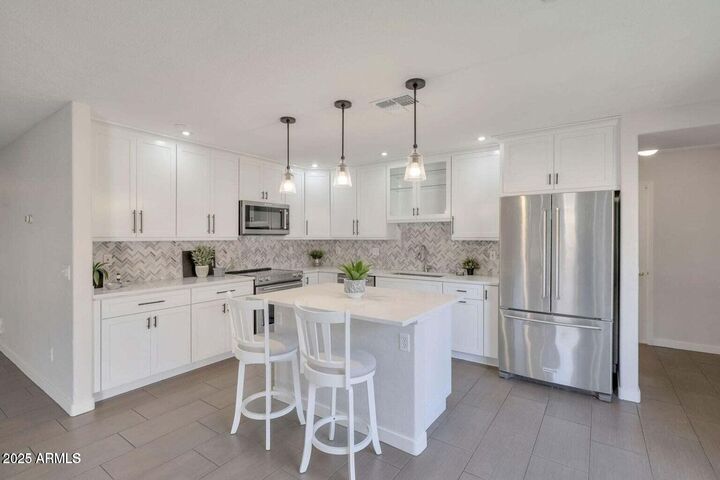 Property Photo: 7500 E Deer Valley Road 99 AZ 85255