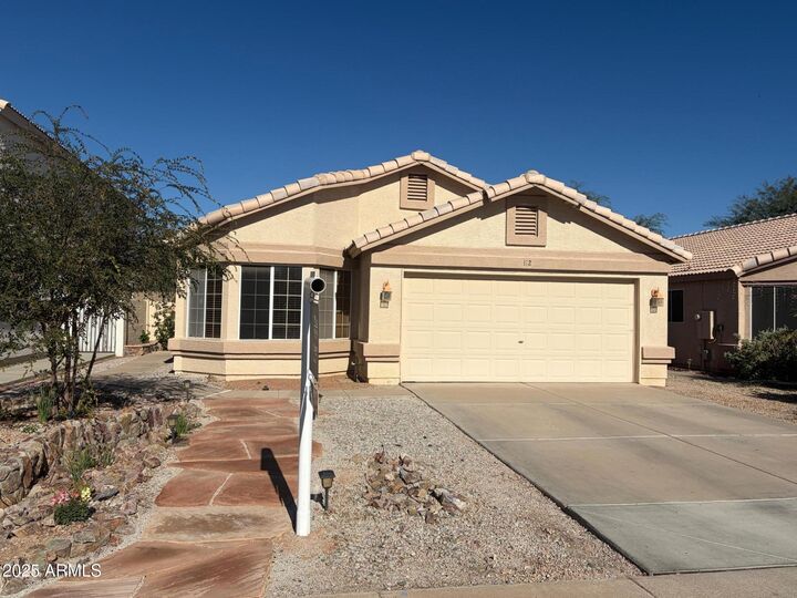 Property Photo:  112 W Smoke Tree Road  AZ 85233 