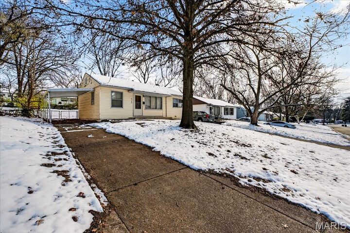 Property Photo:  9746 Millburn Drive  MO 63136 