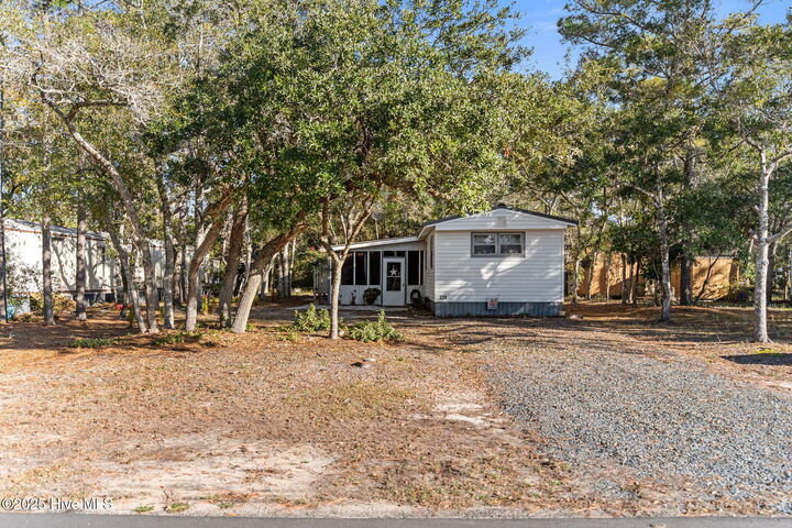 Property Photo:  220 NE 68th Street  NC 28465 