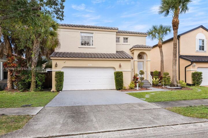 Property Photo:  574 NW 159th Ave  FL 33028 