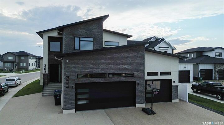 Property Photo: 131 Nazarali Way SK S7V 1X8