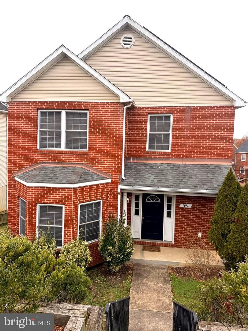 Property Photo:  1986 Retta Gilliam Court SE  DC 20020 