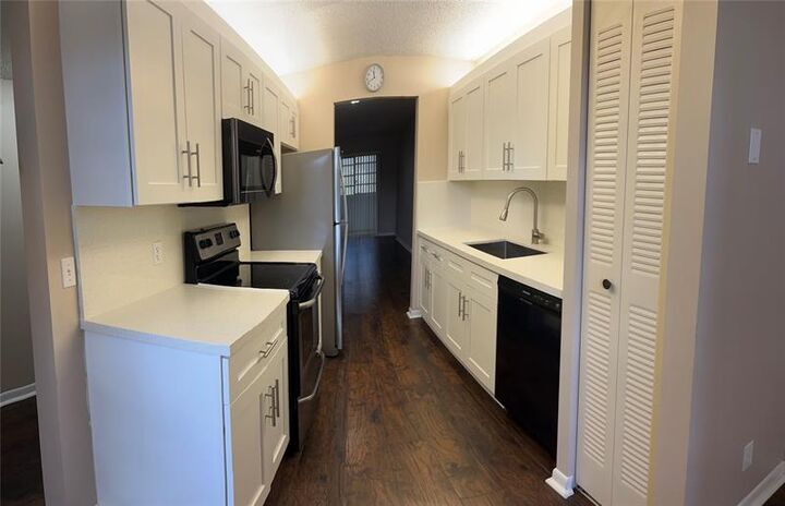 Property Photo:  1100 SW 128th Ter 402  FL 33027 