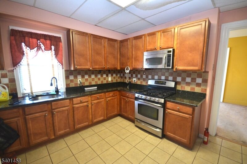 Property Photo:  572 E 25th St 1  NJ 07514 