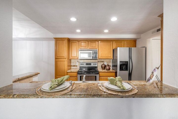 Property Photo:  1010 E Washington Avenue 73  CA 92025 
