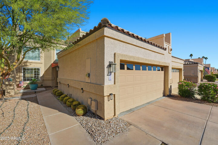Property Photo:  9034 W Port Royale Lane  AZ 85381 