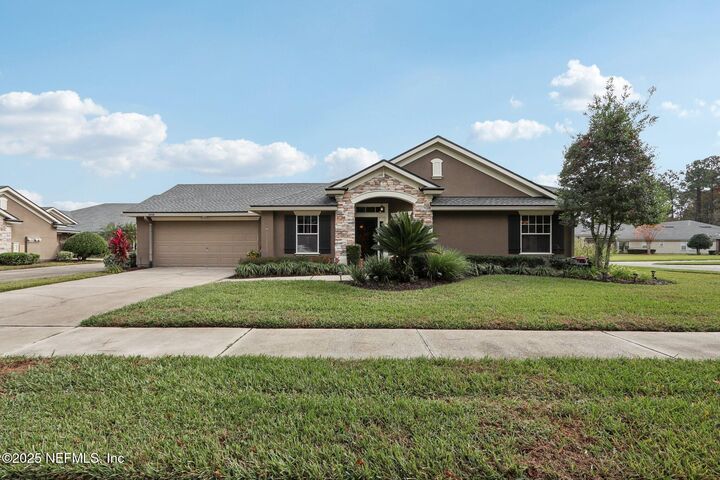 Property Photo: 1870 Copper Stone Drive F FL 32003
