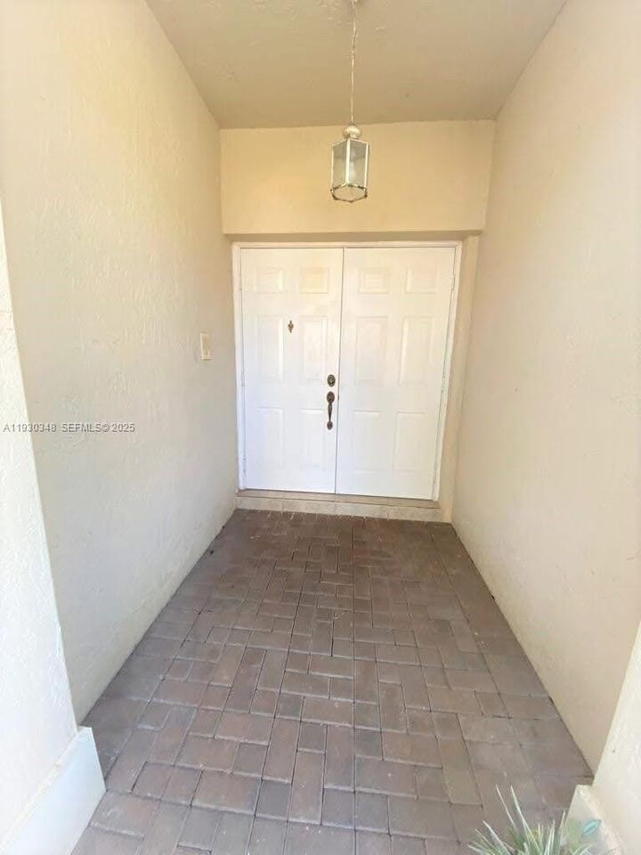 Property Photo: 6834 NW 107th Pl FL 33178