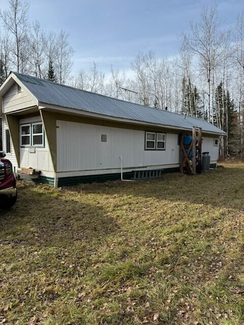 Property Photo: E5499 Taylor Rd MI 49774