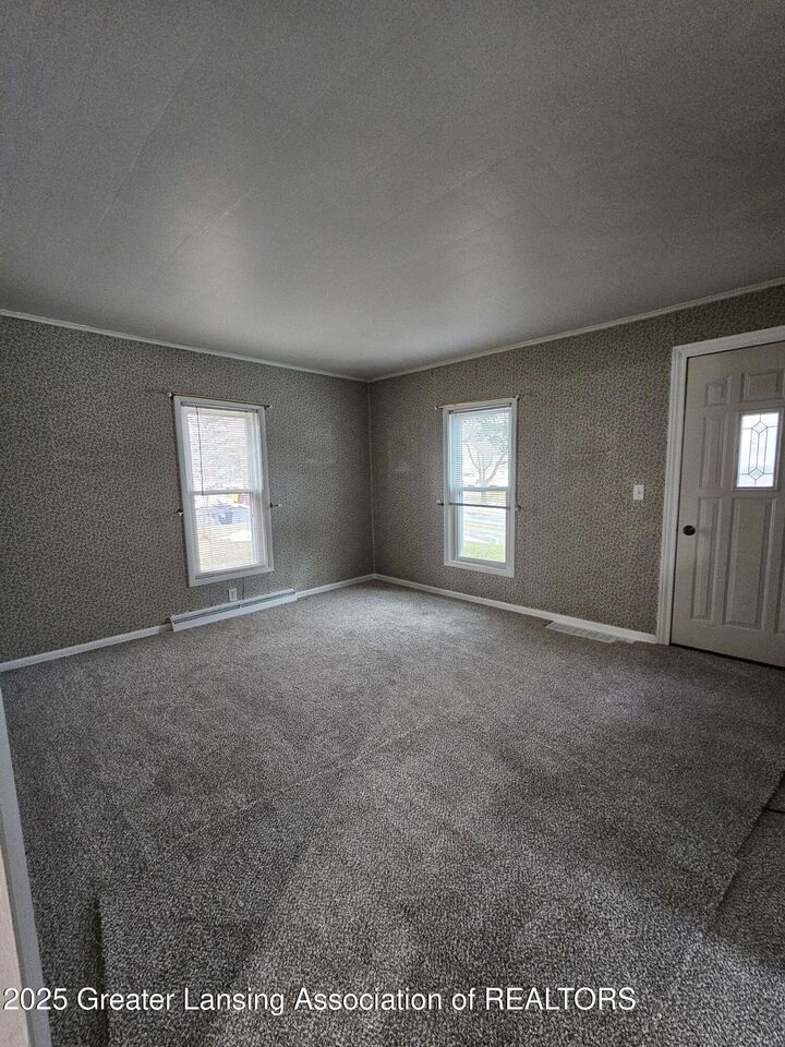 Property Photo:  414 Quarterline Street  MI 48875 