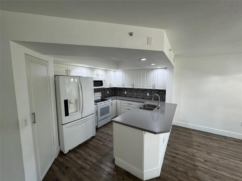 Property Photo:  1651 SW 127th Ave 211A  FL 33027 