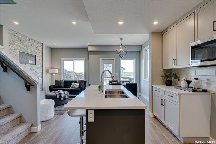 Property Photo:  108 Traeger Common  SK S7V 1R3 
