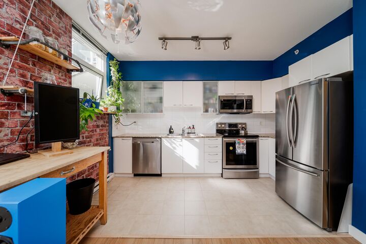 Property Photo:  4028 Knight Street 420  BC V5N 5Y8 