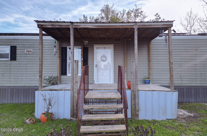 Property Photo:  10626 Happyville Road  FL 32466 