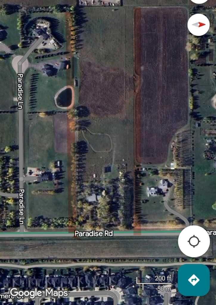 Property Photo: 243039 Paradise Road AB T1X 0M9