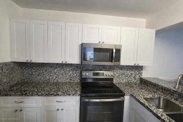 Property Photo:  10501 W Broward Boulevard 209  FL 33324 