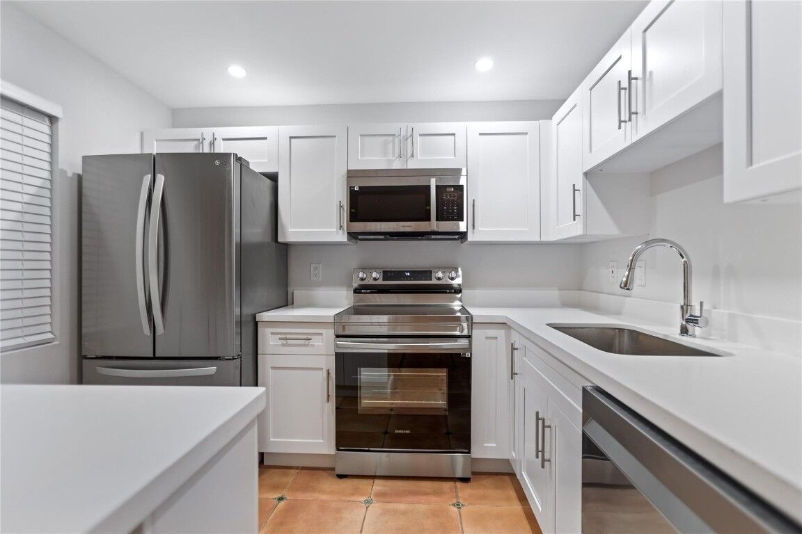 Property Photo:  9823 NW 3rd Street 9823  FL 33324 