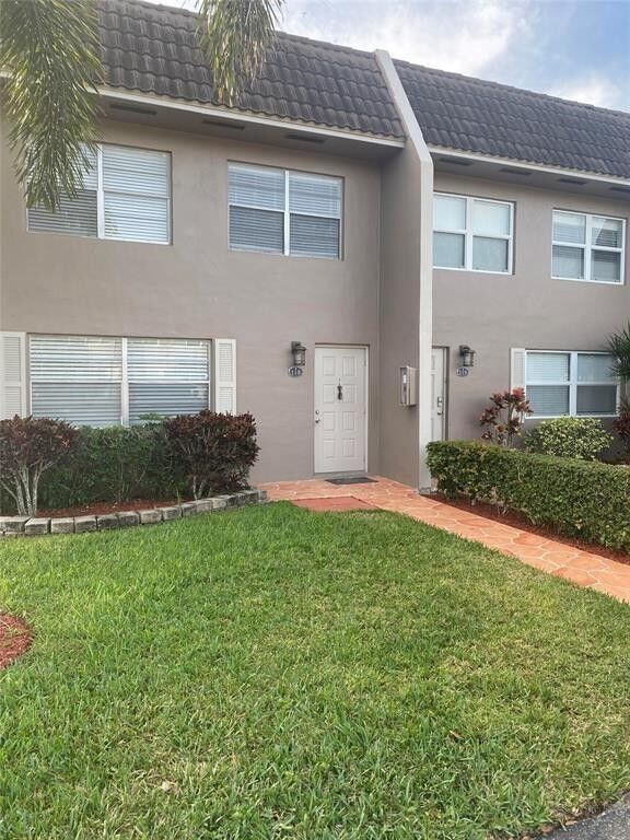 Property Photo:  9050 NW 28th Street 118  FL 33065 
