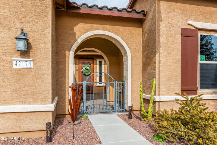 Property Photo: 42174 W Solitare Drive AZ 85138
