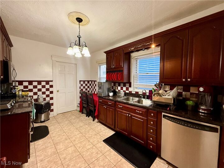 Property Photo:  15220 Lucknow Avenue  OH 44110 