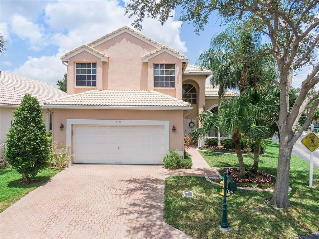 Property Photo:  3302 NW 70th Avenue  FL 33063 
