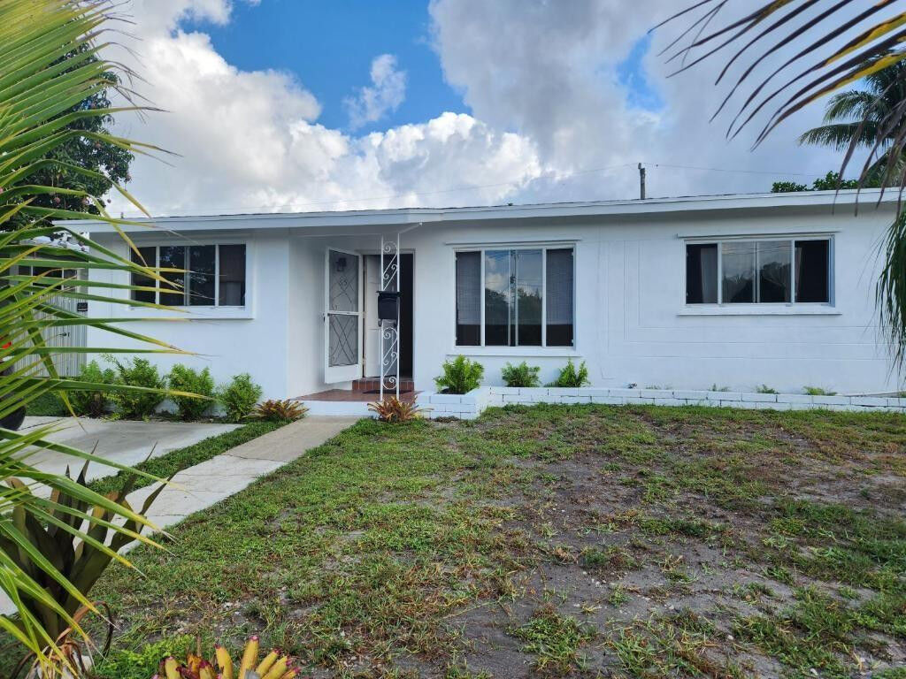 Property Photo:  65 NE 56th Court  FL 33334 