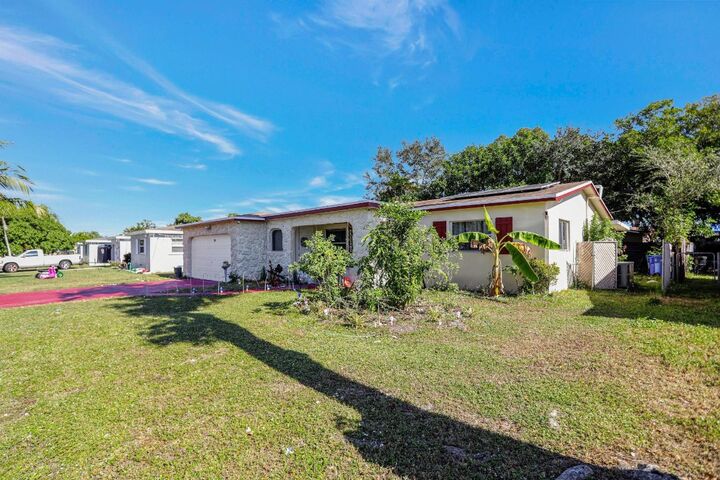 Property Photo:  156 NW 80th Avenue  FL 33063 
