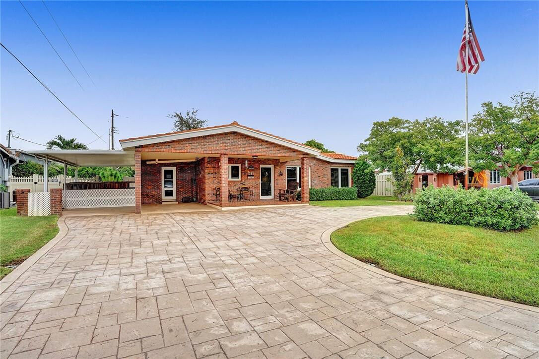 Property Photo:  1311 NE 42nd Street  FL 33334 