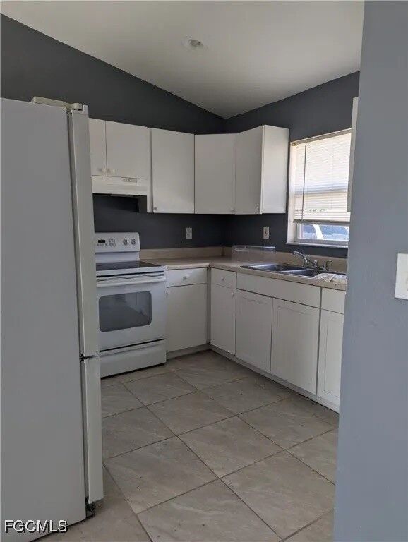 Property Photo:  2407 Mansfield Avenue S  FL 33973 