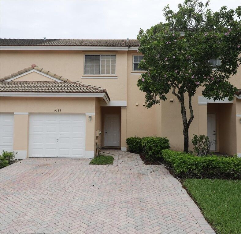 Property Photo:  9183 NW 40th Place 9183  FL 33351 