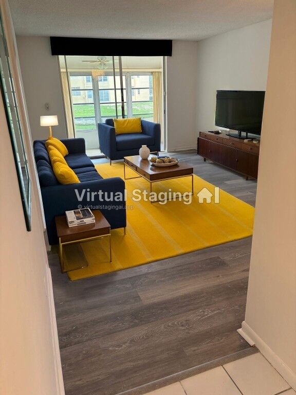 Property Photo:  6070 NW 64th Avenue 107  FL 33319 