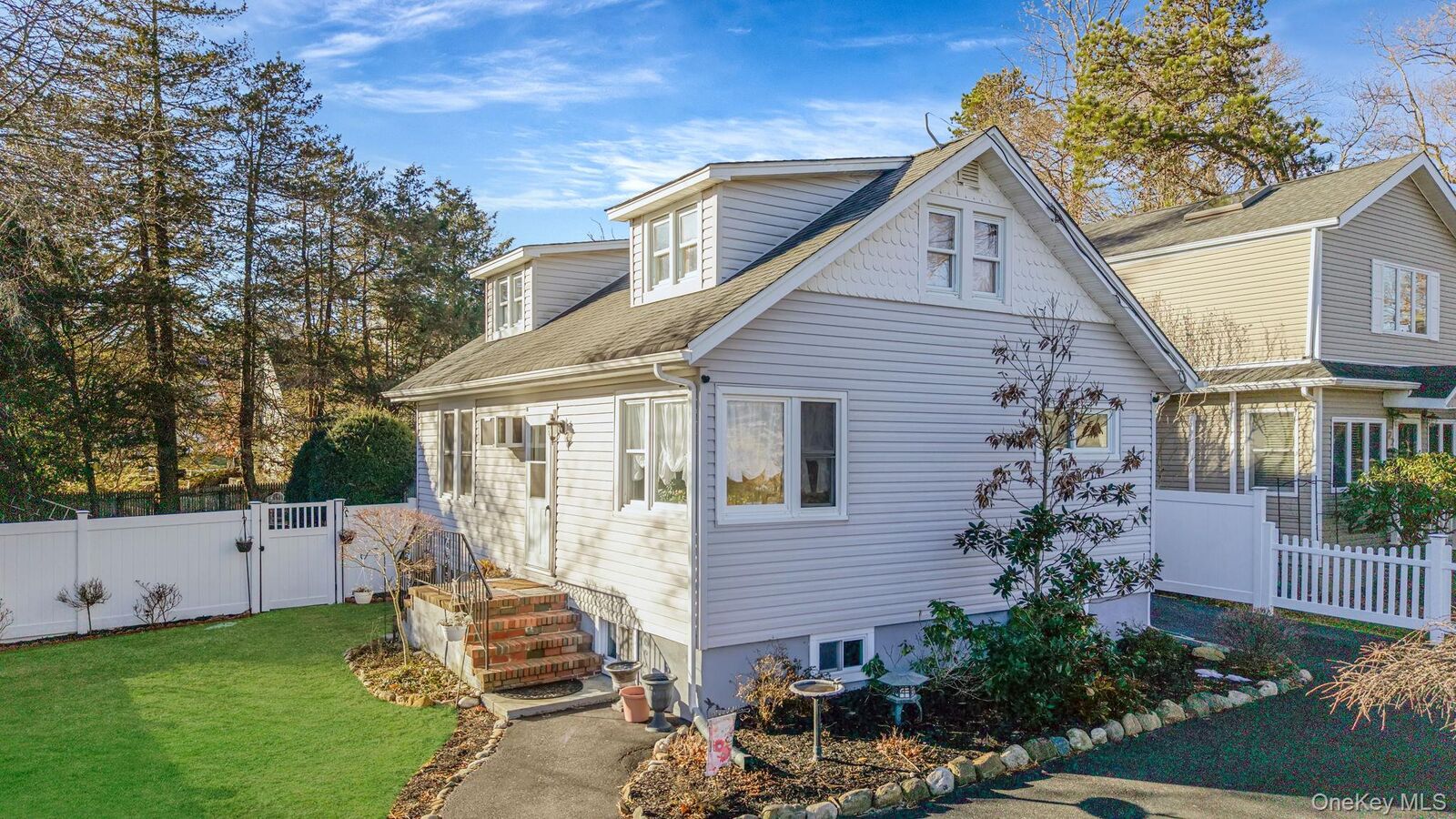 Property Photo:  26 Neptune Road  NY 11778 