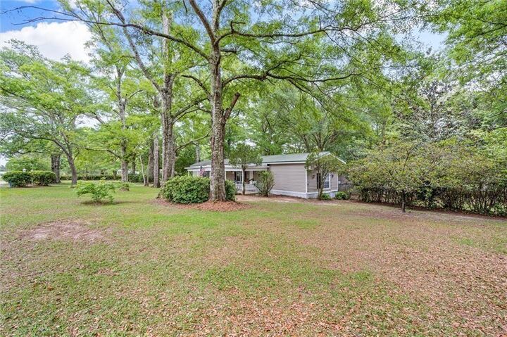 Property Photo:  8675 Hunters Pointe Drive N  AL 36582 