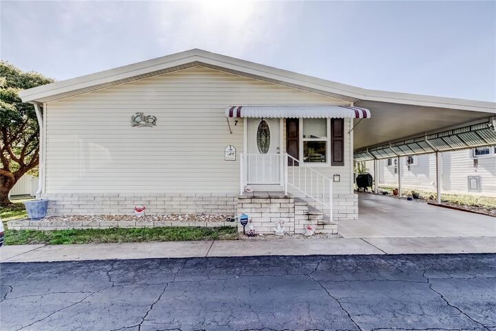 Property Photo:  7 Frangipani Circle 7  FL 33770 