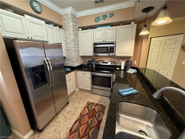 Property Photo:  1076 Winding Pines Cir 203  FL 33909 