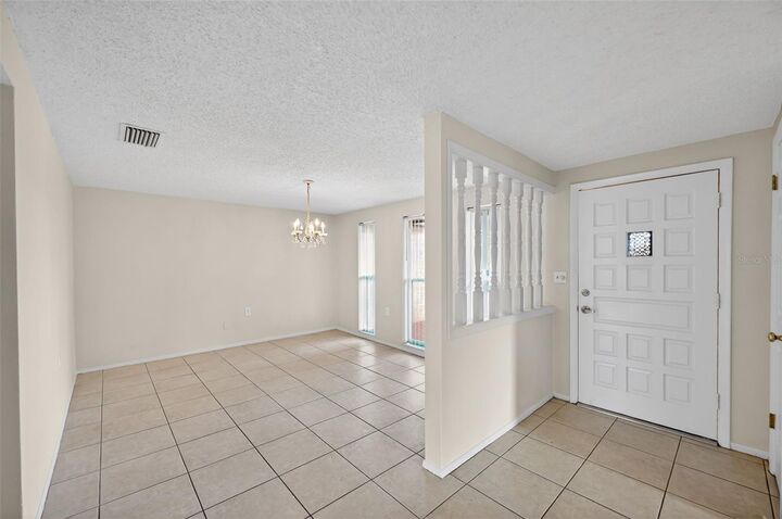Property Photo:  1037 Tamarac Drive  FL 34690 