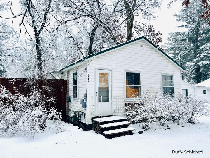 Property Photo:  6716 Chapman Avenue  MI 49337 