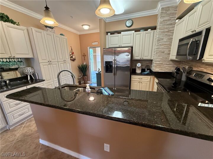 Property Photo:  1076 Winding Pines Circle 203  FL 33909 