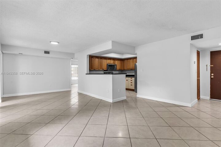 Property Photo:  9135 SW 125th Ave 310P  FL 33186 