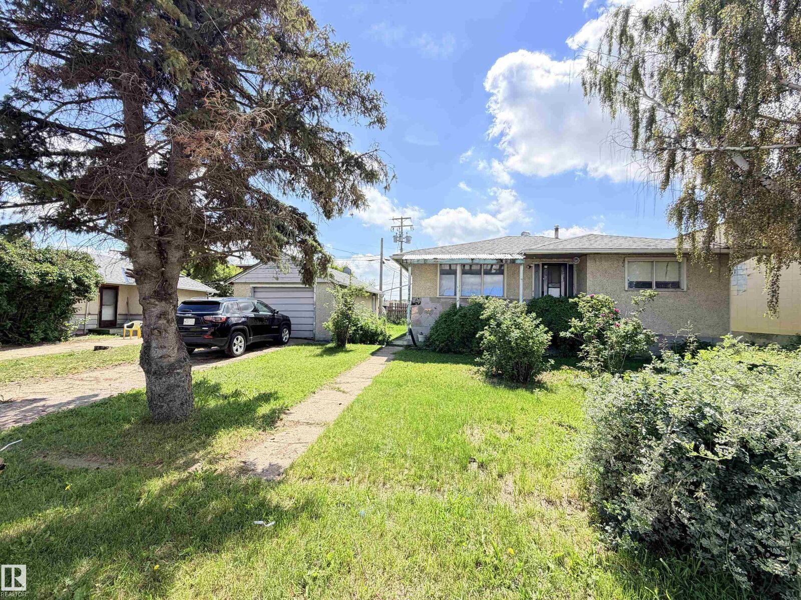Property Photo: 10407 102 Street AB T7P 1K7