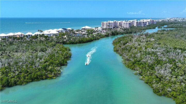 Property Photo: 269 Barefoot Beach Boulevard Ph3 FL 34134