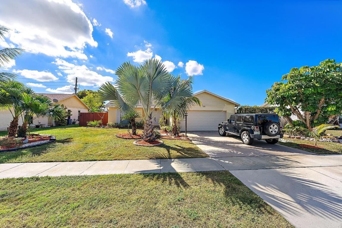 Property Photo:  1199 Jackpine Street  FL 33414 