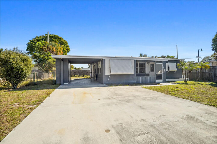 Property Photo:  2432 NE 13th Avenue  FL 33064 