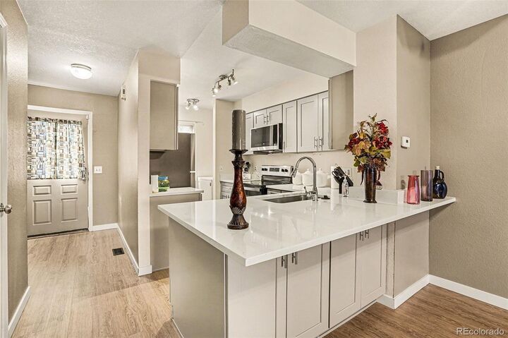 Property Photo:  1662 S Idalia Circle N  CO 80017 