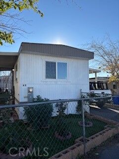 Property Photo:  15251 Village Dr 48  CA 92394 