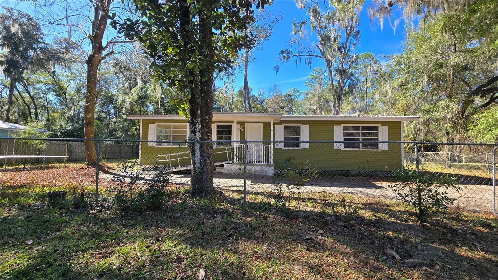 Property Photo:  216 NE 43rd Terrace  FL 32641 