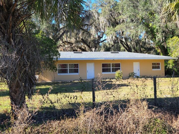 Property Photo:  1212 S State Road 415  FL 32168 