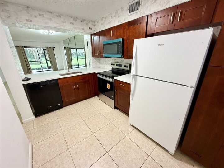 Property Photo:  3355 Jaywood Terrace J111  FL 33431 